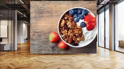 Homemade granola with yogurt and fresh berries Wall mural