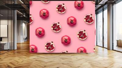 Pattern of fresh pomegranates on pink background Wall mural