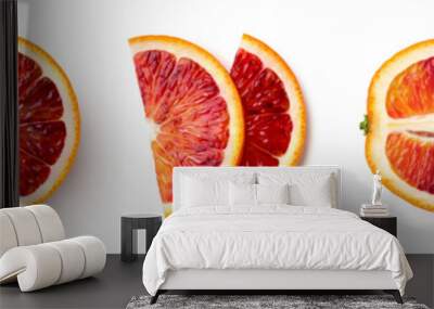 Whole, half and sliced red blood orange fruit Wall mural