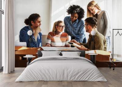 In the university classroom, a group of attentive students gathers, books and notes in hand, earnestly preparing for an upcoming lecture. Wall mural