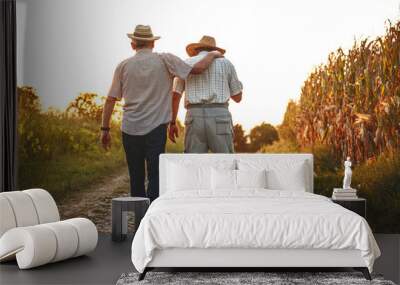 Two old friends. Two senior friends walks through corn field on sunset.	 Wall mural