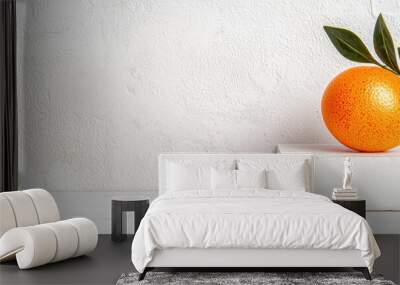 fresh orange fruit with leaves on a white background Wall mural