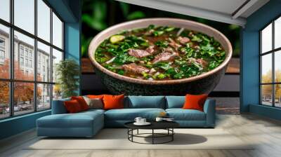 Hearty beef and vegetable soup in a ceramic bowl Wall mural