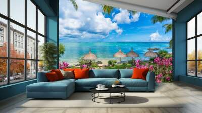 Public beach with lounge chairs and umbrellas in Pointe aux Canonniers, Mauritius island, Africa Wall mural