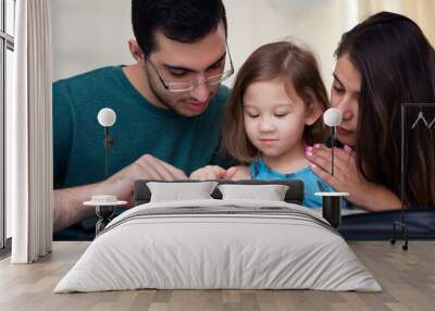 Family Reading the Bible Together Wall mural