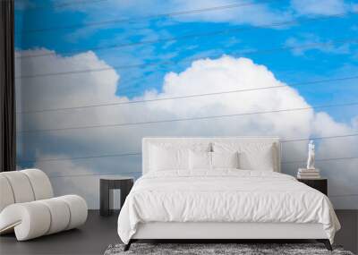 High voltage poles that transmit high voltage electricity. Year 2024 has a beautiful sky. Wall mural