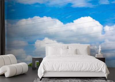 High voltage poles that transmit high voltage electricity. Year 2024 has a beautiful sky. Wall mural