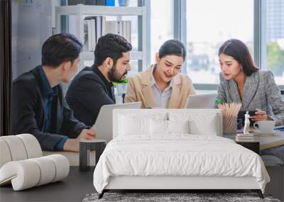 Group of millennial Asian Indian multinational multicultural male and female businessman businesswoman teamwork in formal suit sitting smiling brainstorming meeting together in office conference room Wall mural