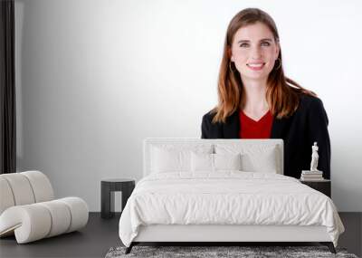 Portrait closeup isolated studio shot of Caucasian confident smart professional successful long hair female businesswoman in formal working suit standing smiling look at camera on white background Wall mural