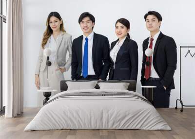 Portrait studio full body shot Asian young professional successful male female businessmen businesswomen management group in formal suit standing smiling posing showing thumb up on white background Wall mural