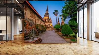 Background of old Buddha statues in Thai religious attractions in Ayutthaya Province, allowing tourists to study their history and take public photos. Wall mural