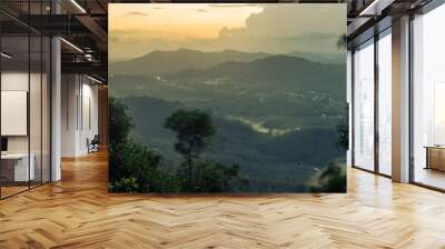 Natural background, high angle from the high mountains that can see the scenery around, the wind blows through the cool, blurred of traveling, the integrity of the moist forest. Wall mural