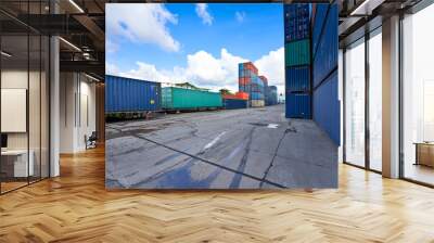 container site service with many boxes for shipping business with blue sky Wall mural