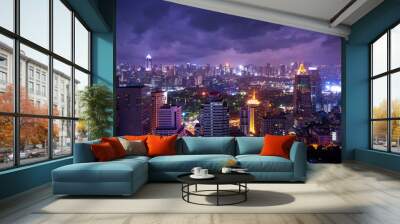 night cityscape with stormy cloud on sky Wall mural