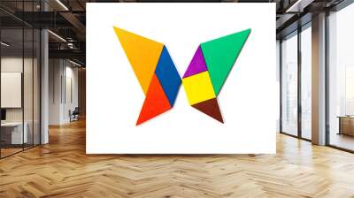 Color wood tangram puzzle in butterfly shape on white background Wall mural