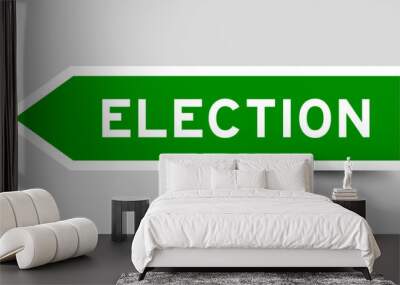 Green color arrow shape sticker label with word election on gray background Wall mural