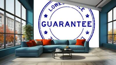 Grunge blue guarantee lowest price round rubber seal stamp on white background Wall mural