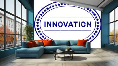 Grunge blue innovation word oval rubber seal stamp on white background Wall mural