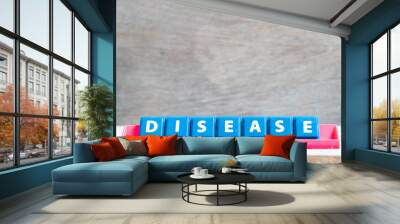 Tile alphabet letter with word disease in red color rack on wood background Wall mural