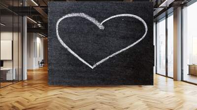 White coloe chalk drawing as heart shape on blackboard background with copy space Wall mural