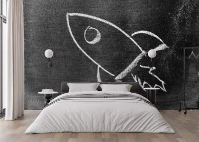 White color chalk hand drawing in rocket shape on blackboard or chalkboard background (Concept for new experience, start up the business) Wall mural