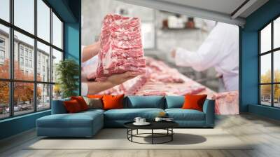 Butcher cutting pork meat food industry concept Wall mural