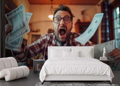 A man with an ecstatic expression holds up a fan of money, capturing the joy of financial success. The background suggests a work environment, adding context to the achievement being celebrated. Wall mural