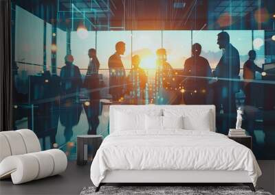 Professionals network in a high-tech office environment, silhouetted against the luminous backdrop of a city at dusk Wall mural