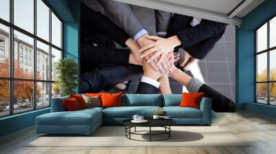 business team joining hands Wall mural