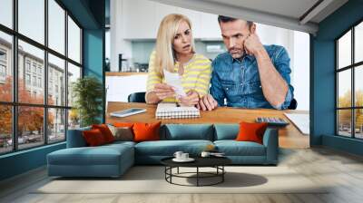 Couple argue over home finance and expenses Wall mural