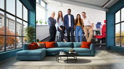 Group of diverse team of colleagues at office standing together Wall mural