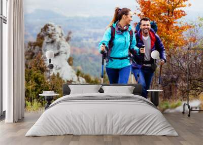 happy couple hiking Wall mural