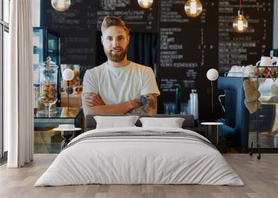 happy small business owner standing at coffee shop Wall mural