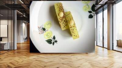 Green melon dessert on a white plate.  Summer dish. Wall mural