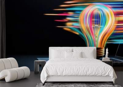 colorful light bulb blasting on a laptop screen made of glowing light beams, a black background, copy space Wall mural