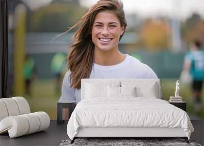 female model smiling, white cotton mock up crewneck t-shirt, carrying a soccer ball Wall mural