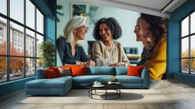 Multigenerational team of women at a productive business meeting   Wall mural