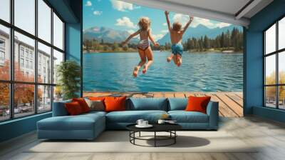 photograph of A little boy and little girl jumping off the dock into a beautiful mountain lake. Having fun on a summer vacation,   Wall mural