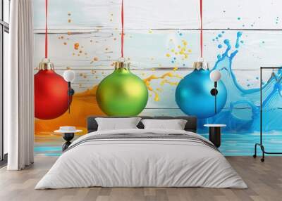 three christmas ornaments hanging by a ribbon, white fence background, liquid color spill, splach Wall mural