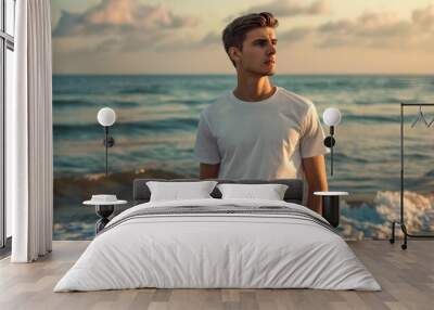 white blank mockup of a t-shirt bella - canvas 3001 with male model, beach background  Wall mural