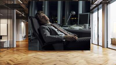 Businessman falling a sleep in an office. Wall mural