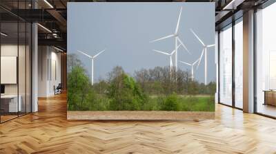 Wind turbines in spring day. Wall mural