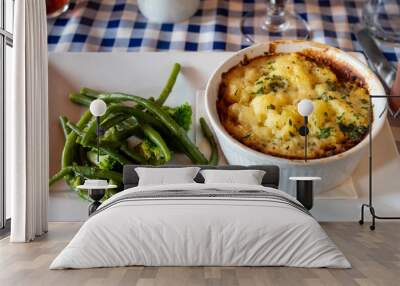 Seasoned Lentils and mushrooms pie slow cooked in red wine, topped with.cheddar mash and served with seasonal vegetables Wall mural