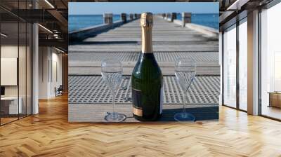 Summer time in Provence, two glasses of cold champagne cremant sparkling wine on famous Pampelonne sandy beach near Saint-Tropez in sunny day, Var department, France, beach club party Wall mural