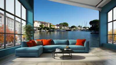 Travel and vacation destination, view on houses, roofs, canals and boats in Port Grimaud, Var, Provence, French Riviera, France Wall mural