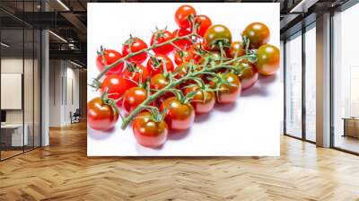 Vine of fresh ripe sweet cherry tomatoes ready to eat on white background Wall mural