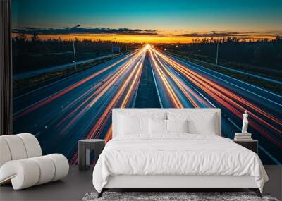 A breathtaking highway is seen with dazzling light trails heading towards a bright horizon, symbolizing a visionary future and connecting roads to 2025. Wall mural