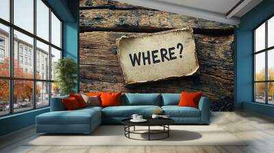 A paper that reads 'Where?' is positioned on top of worn, rustic wooden planks, evoking a vintage feel that combines curiosity with a historical aesthetic. Wall mural