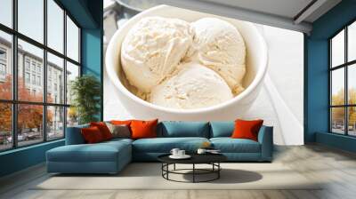 Vanilla ice cream scoops in white bowl  Wall mural