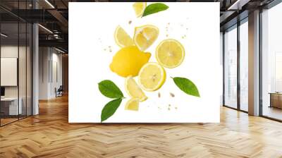 Fresh lemon fruit whole and slices with leaves and drops falling flying isolated on white Wall mural